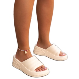 Beige massive Wegahta flip-flops