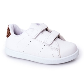 Børns hvide og gyldne sneakers