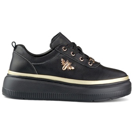 Sorte sneakers i læder med guldtilbehør