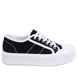 Damesneakers på den sorte platform