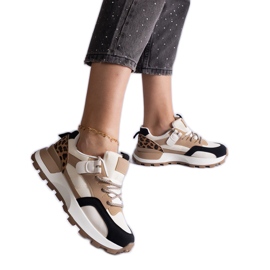 Beige sneakers dekoreret med et dyremotiv