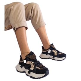 Sorte sneakers med guldindlæg