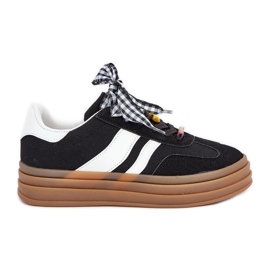 Kvinders sneakers med sorte stifter