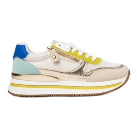 Kvinders sportsgrøn og beige sneakers