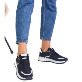 Sorte kvinders sneakers med en gylden indsættelse