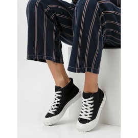 Kvinders arvel sorte sneakers