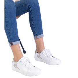 Kvinders hvide sneakers med prægning og glitter