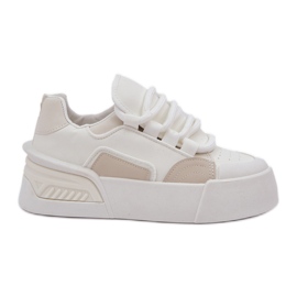 Kvinders sneakers med tykke snørebånd på den hvide platform