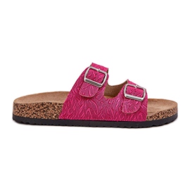 Materiale flip -flops på en kork sål med spænder. lyserød