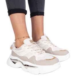 Beige kvindes sneakers dekoreret med glitter