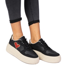 Sorte kvinders sneakers med et brokadehjerte