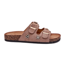 Kvinders flip flops på en kork sål med khaki spænder og stifter beige