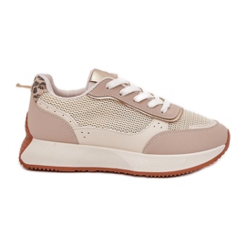 Kvinders sportssko med et net på platformen beige