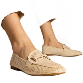 Beige kvinders åbne loafers med et ornament