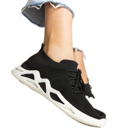 Sorte kvinders sneakers med en soking øvre