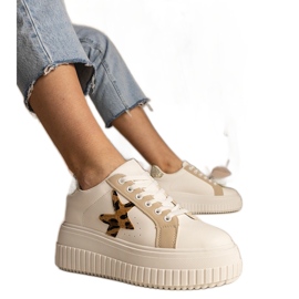 Hvide og beige sneakers dekoreret med glitter og stjerne