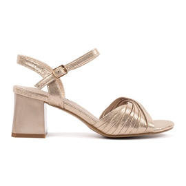 Goodin Golden elegante sandaler på en lav stolpe gylden