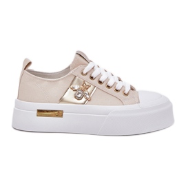 Kvinders sneakers på platformen med dekorativ detalje beige