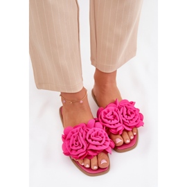 Flat -Hælede kvinders flip flops med dekorative fuchsia blomster lyserød