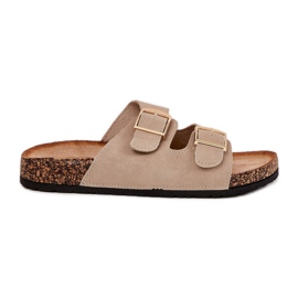 Kvinders flip flops på en korkplatform med gyldne klemmer beige