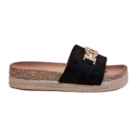 Kvinders flip flops med en gylden detalje på platformen med brokade sort
