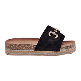 Kvinders flip flops på platformen med et gyldent ornament og brokade sort