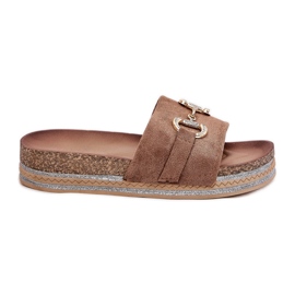 Kvinders flip flops på platformen med et gyldent ornament og khaki glitter beige
