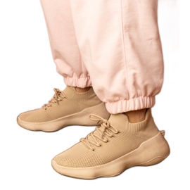 Beige sports sneakers med en sokker øvre