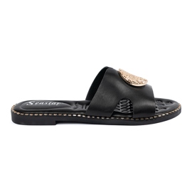Seastar Sort flip flops med en gylden dekoration