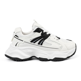 Kvinders sneakers på en tyk hvid sål