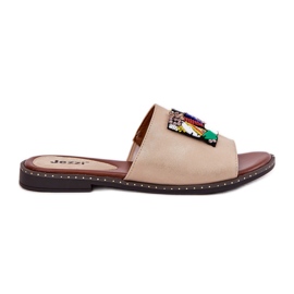 Jezzi Flat -Hælet kvinders flip flops med gyldent ornament