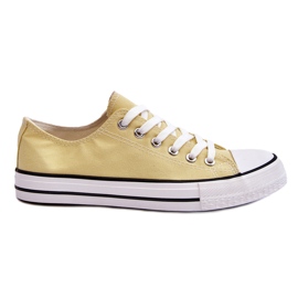 Klassiske lave kvinders gule sneakers
