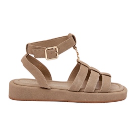 Kvinders sandaler på platformen med den gyldne detalje khaki beige