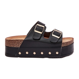 Kvinders flip flops med spænder på en massiv platform sort