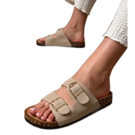 Beige flapper med klemmer på en kork sål