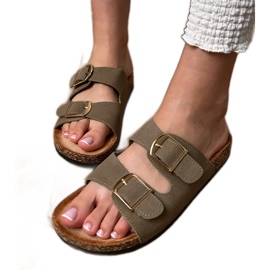 Grøn flip flops med klemmer på en kork sål
