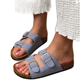 Blå flip flops med klemmer på en kork sål
