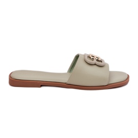 Flade kvinder flip flops med en dekorativ grøn detalje