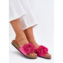 Kvinders flip flops på en kork sål med fuchsia blomster lyserød