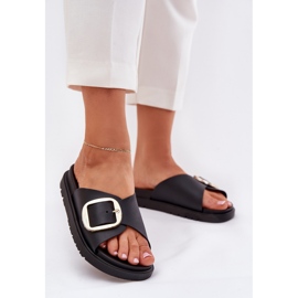 Kvinders flip flops på platformen med en gylden klemme sort
