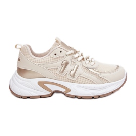 Kvinders sneakers på en massiv beige sål