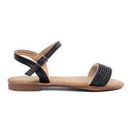 Shelvt Sorte sandaler på en flad sål
