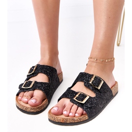 Sort glitter flip flops på flådens korksål