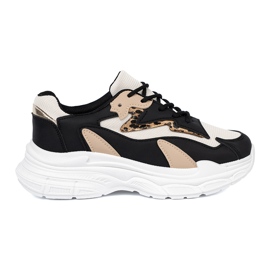 Shelvt Sort og beige kvinders sneakers på en tyk sål