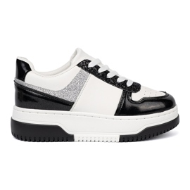 Shelvt Sorte og hvide sneakers med skinnende sølvdetaljer