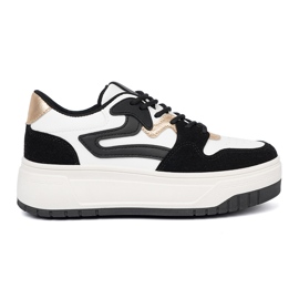 Shelvt Sorte og hvide sneakers med gyldne detaljer