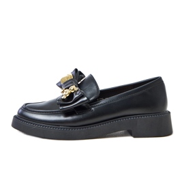 Sorte loafers med en bue og teriwa bamse