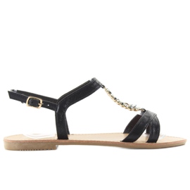 Sandaler med dekorative sorte sten