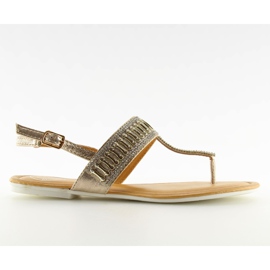 Flip-flops med gyldne guldsten gylden