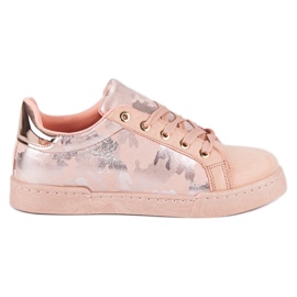 Lyserøde sneakers på bindingen